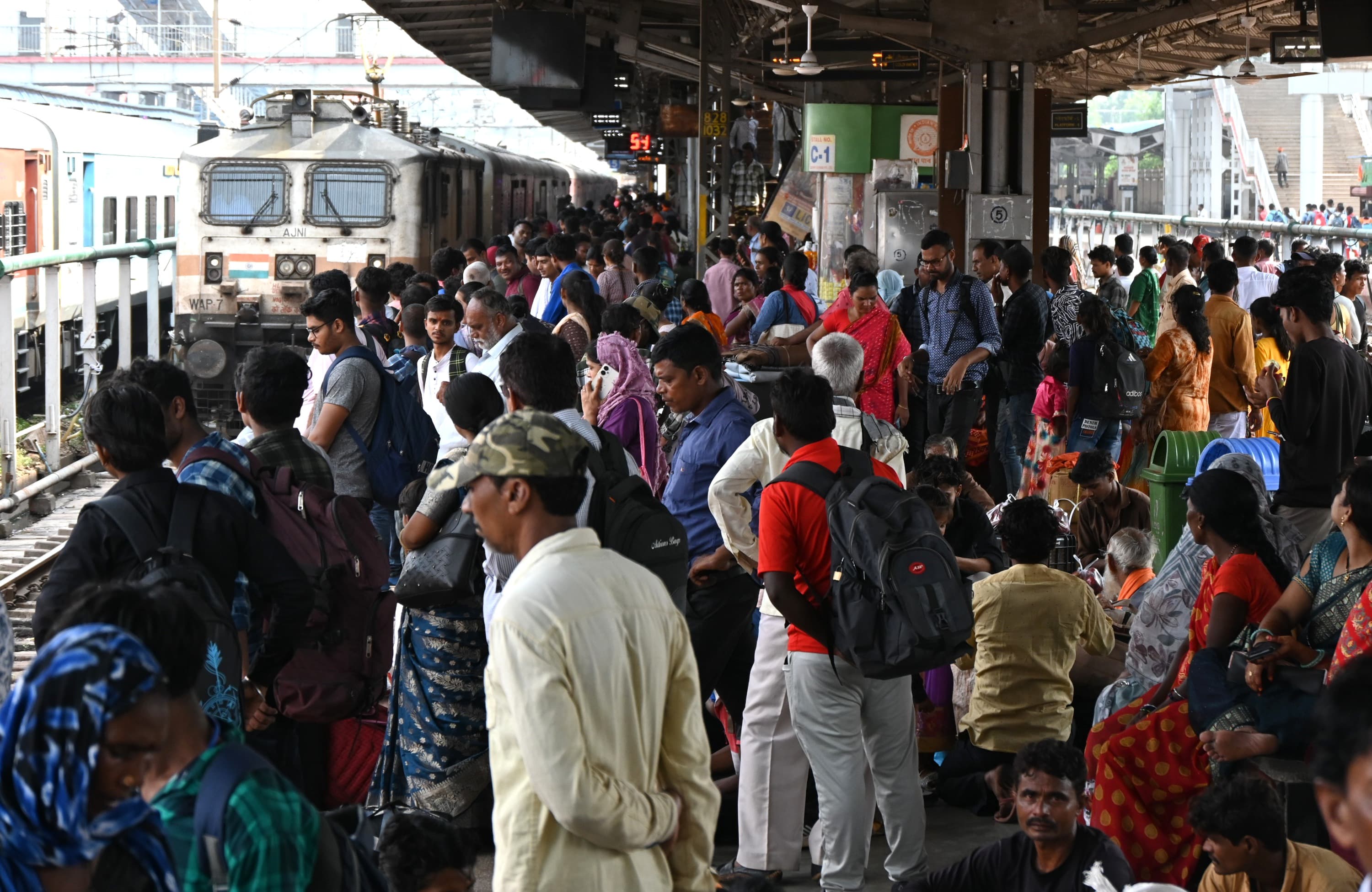 Women were seen waiting for the local train in the station