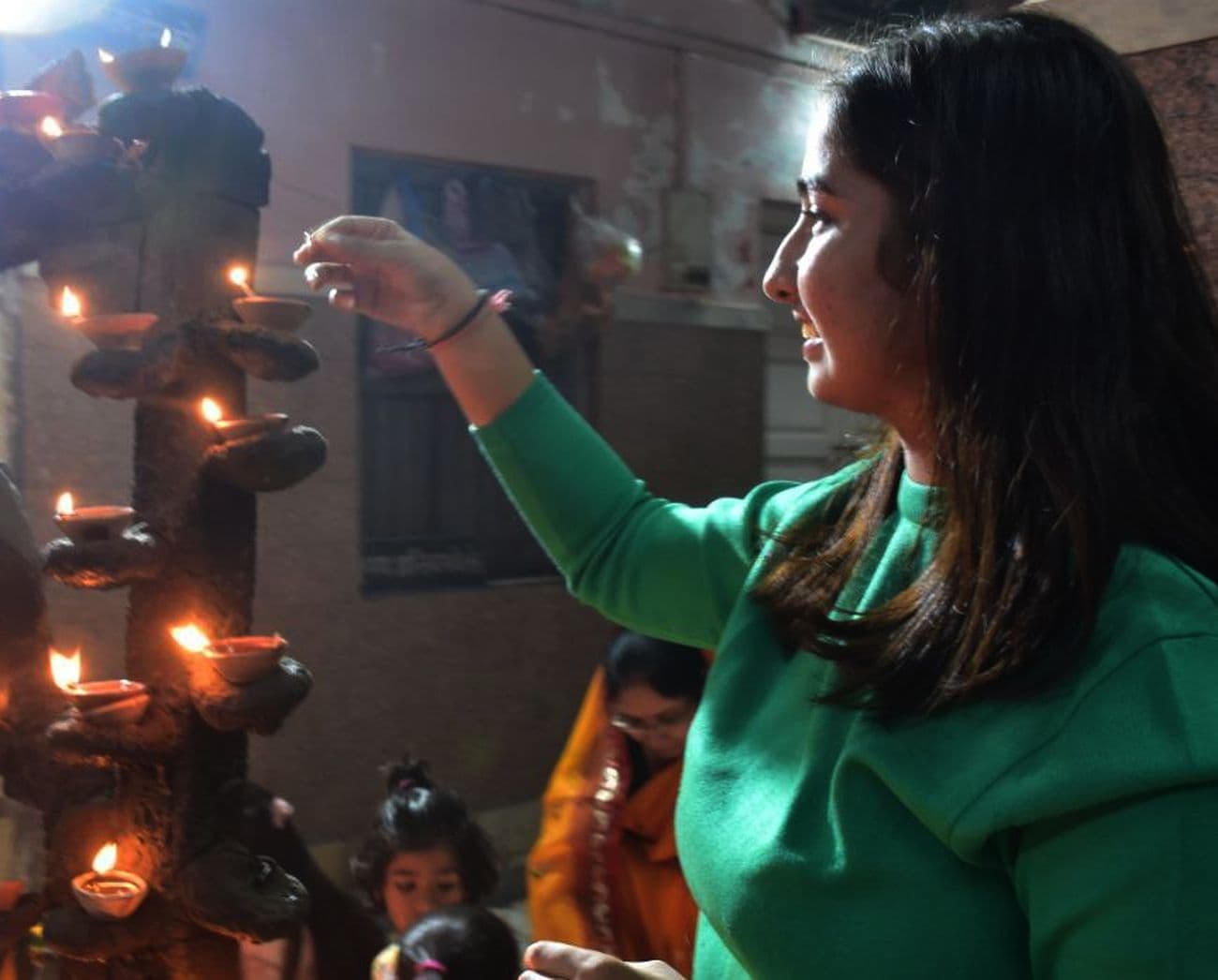 Illuminated temples on Kartik Purnima: Temples and buildings illuminated with lamps on Dev Diwali.