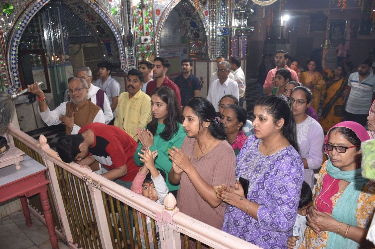 Illuminated temples on Kartik Purnima: Temples and buildings illuminated with lamps on Dev Diwali.