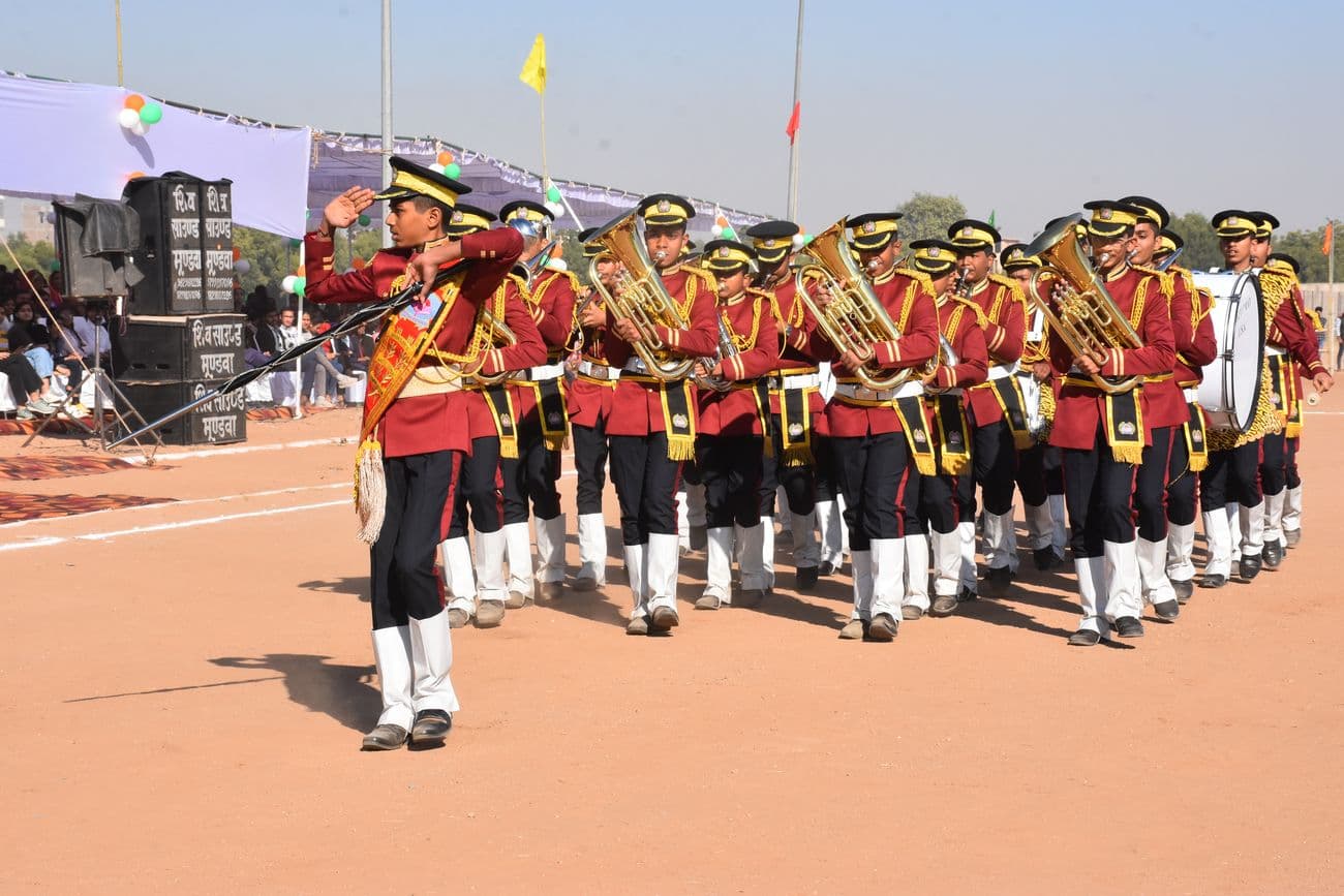 Tricolor of Republic hoisted with pride, salute of march past