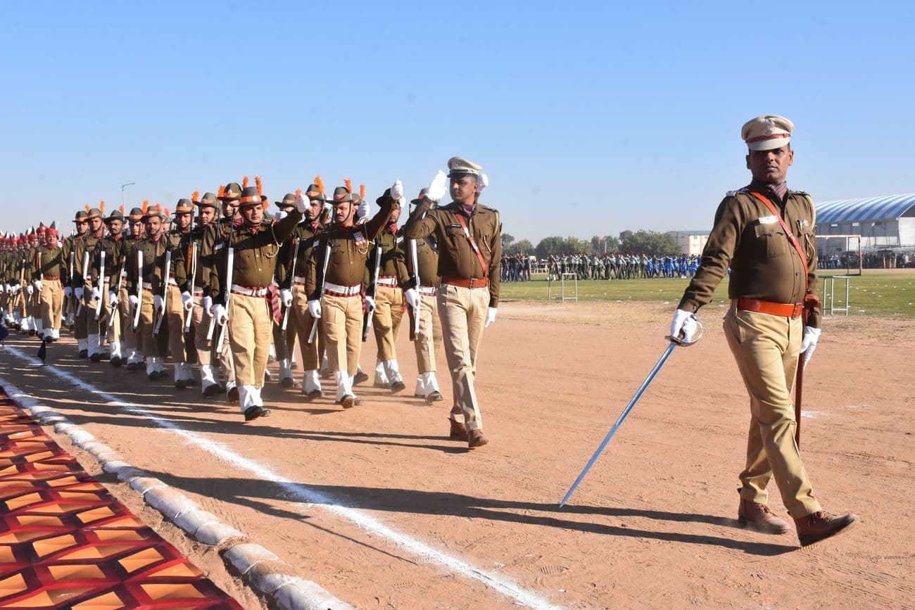 Tricolor of Republic hoisted with pride, salute of march past